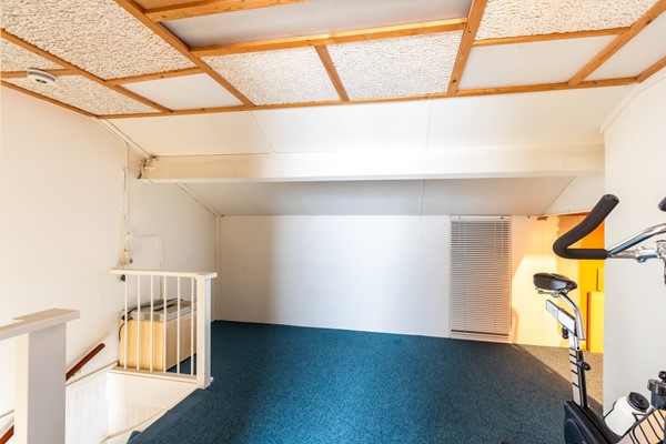 Foto - Te koop: tussenwoning gelegen aan groenvoorziening